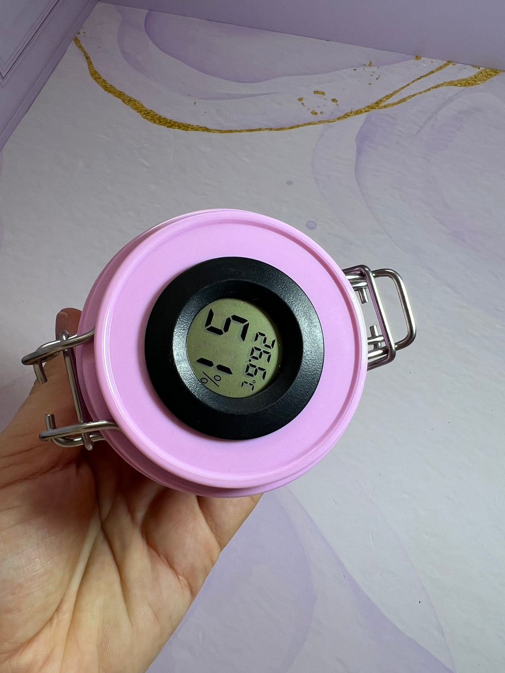 Pot de stockage de colle à cils avec température